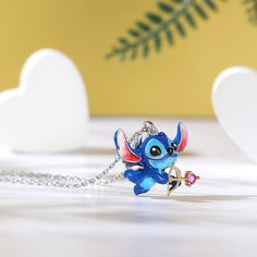 Featuring a beloved cartoon character, this necklace can be an eye-catching addition to most outfits. Crafted in sterling silver with red enamel ears, the adorable extraterrestrial holds a heart-shaped arrow. Be love-struck by extraterrestrial with this adorable necklace.Carat Weight: 0.145 ctStone Size: 3*3 mmStone Type: Jeulia® StoneNumber of Stones: 1 Stone Color: FuchsiaStone Shape: HeartWeight: 4 gWidth: 22.4 mmHeight: 18.5 mmThickness: 8.2 mmMaterial: 925 SilverPlating Color: Silver, Yello Cupid Arrow, Dreamy Garden, Cupids Arrow, Cartoon Character, Sterling Silver Necklace, Cartoon Characters, Sterling Silver Necklaces, Stone Color, Silver Necklace