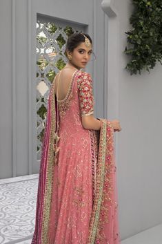 Varying hues of pinks and fuschia, counterbalanced with celadon and vermillion, this cotton net peshwas is crafted with meticulous attention to detail. The handcrafted techniques in traditional zardoze, sequins and gota work pay homage to elegance and magnificence. The net dupatta mirrors the hints of colour through it Bridal Mehendi Dress, Pishwas Lehenga, Pakistani Pishwas, Pishwas Pakistani, Nameera By Farooq, Dupatta Bridal, Mehendi Dress, Pakistani Bridal Dress, Lehenga Dupatta