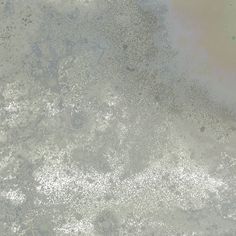 an image of water and sand from above