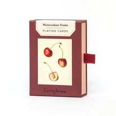 a card game with two cherries on it