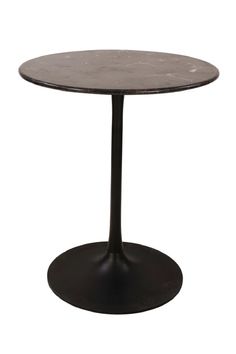 a round table with an iron base and black marble top, on a white background