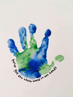 a hand print with words on it that says, keep the whole world in my hands