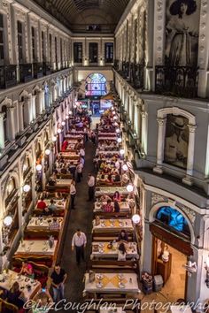 an overhead view of a restaurant with people sitting at tables in the middle of it