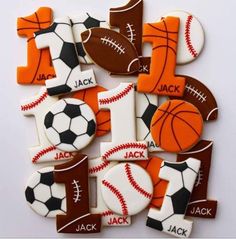 decorated cookies are arranged in the shape of numbers for sports themed birthdays and parties