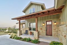 a house with a covered porch and patio