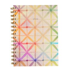 a spiral notebook with colorful geometric designs on it