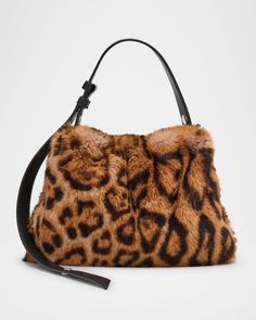 SIMONMILLER "Puffin" shoulder bag in cheetah printed faux fur (polyester)    Adjustable shoulder strap    Open top     Lining: Polyester    Approx. 6.7"H x 9.4"W x 1.6"D    Imported Fur Purse, Leopard Bag, Fashion Merchandising, Faux Fur Bag, Printed Purse, Bag Outfit, Dream Bags, Fur Bag, Fall Fits