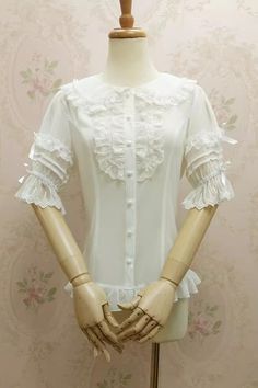 Fabric: Chiffon Color: Black, White Collar: Doll Collar Sleeve Length: Short Sleeves Sleeve Shape: Trumpet Sleeves Feature: Lace, Slim Style: Sweet Include: Blouse*1 (Any of the accessory is not included.) Size (IN) Bust Waist Shoulder Width Length XS 32.28 25.98 13.39 21.26 S 33.86 27.56 13.78 21.65 M 35.43 29.13 14.17 22.05 L 37.01 30.71 14.57 22.44 XL 38.58 32.28 14.96 22.83 2XL 40.16 33.86 15.35 23.23 Size (CM) Bust Waist Shoulder Width Length XS 82 66 34 54 S 86 70 35 55 M 90 74 36 56 L 94 78 37 57 XL 98 82 38 58 2XL 102 86 39 59 White Chiffon Short Sleeve Top, White Chiffon Blouse With Short Sleeves, White Chiffon Top For Wedding, Feminine Short Sleeve Blouse With Lace Patchwork, Feminine Blouse With Lace Patchwork And Short Sleeves, Chiffon Ruffle Blouse For Wedding, Cute Short Sleeve Party Blouse, Cute Short Sleeve Blouse For Party, White Fitted Cute Blouse