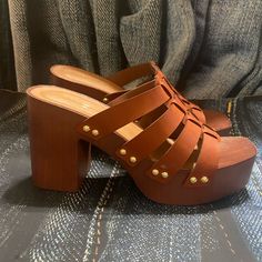 Madden Girl 'Direct' Sandals. Man Made Materials Including Strappy Top Attached With Gold Grommets. A 1.5" Platform Sole With A 4" Heel. Seems To Run Narrow Brown Platform Heels With Open Heel, Brown Platform Lace-up Sandals For Summer, Brown Slip-on Platform Heels, Brown T-strap Sandals With Woven Sole And Open Toe, Brown Open Toe T-strap Sandals With Woven Sole, Madden Girl Shoes, Strappy Top, Shoes Platform, Girl Shoes