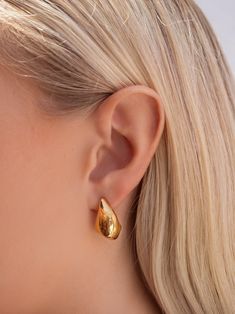 Earrings in Stainless Steel with Gold Plating Size: 21.6mm x 13mm Product code: WEAR_042 Designer's Notes Introducing our exquisite Drop Earrings, designed to add a touch of elegance and sophistication to any look. Perfect for both everyday wear and special occasions, their versatile style complements a wide range of outfits. Crafted with meticulous attention to detail, our Drop Earrings are the perfect accessory to elevate your ensemble with a touch of understated glamour. Please note that all our pieces are crafted by hand and one-of-a-kind, and may therefore vary slightly in size, shape, and color. 2.9.1.0 Special Occasion, Everyday Wear, Jewelry Box, Gold Plate, Women Jewelry, Drop Earrings, Gold, How To Wear, Color