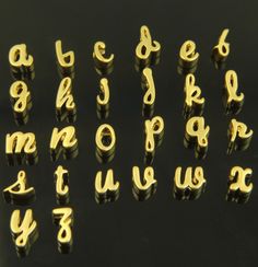 the letters and numbers are made out of gold colored metal