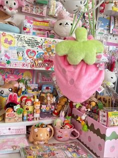 there are many stuffed animals and toys on the shelves