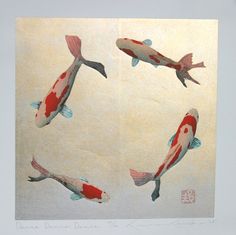 four koi fish are swimming in the water