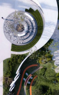 an aerial view of a circular garden structure