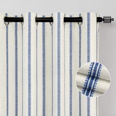 blue and white striped curtains with black hardware