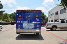 an ambulance is parked in a parking lot