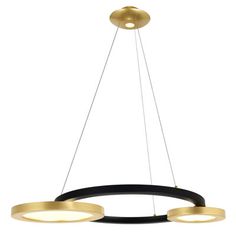 three circular lights hanging from the ceiling with black and gold rings on each light fixture