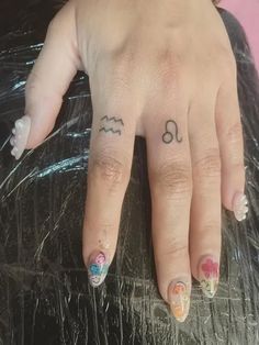 Leo Finger Tattoos Leo Tattoo On Finger, Leo Tattoo Finger, Leo Finger Tattoos For Women, Finger Tattoos Zodiac Sign, Leo Hand Tattoos For Women, Leo Finger Tattoo, Zodiac Finger Tattoo, Leo Hand Tattoos, Leo Tattoo Ideas