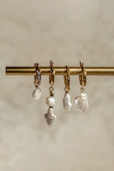 The pearl hoops everyone needs. Water resistant and guaranteed to turn heads! MaterialFreshwater pearls and 14k gold filled hoops and beads. Hoops With Pearls, Earring Huggies, Gold Filled Hoops, Climber Earrings, Gold Pearl Earrings, Pearl Earring, The Pearl, Gold Pearl, Freshwater Pearls