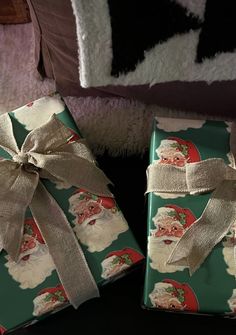 two wrapped presents sitting next to each other