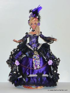 a barbie doll dressed in purple and black