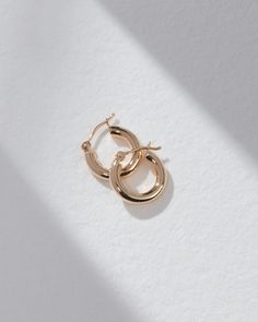 Add some gold to your ear party stack with our Amalfi Huggies, made from 100% 14K Gold and designed for everyday wear. The hollow tubing makes these earrings super lightweight, ensuring a comfortable fit all day long. Classic Huggie Earrings In Recycled Gold, 14k Gold Filled Earrings With Polished Finish For Everyday, Everyday 14k Gold-filled Earrings With Polished Finish, Everyday 14k Gold Filled Earrings With Polished Finish, Classic Small Hoop Earrings In Recycled Gold, Small Hoop Earrings In 14k Gold With Shiny Finish, Small Hoop 14k Gold Earrings With Shiny Finish, Minimalist 14k Gold Filled Earrings With Polished Finish, Yellow Gold Earrings With Shiny Finish For Everyday