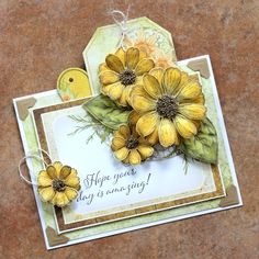 a close up of a card with flowers on it