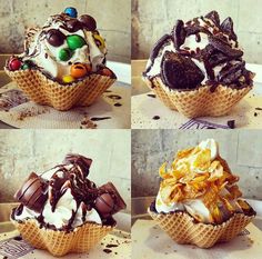 four different types of ice cream in waffle cones with chocolate and candy toppings