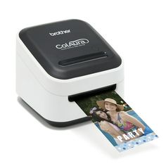 a printer with a photo on the side and a sticker attached to it's side