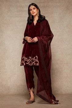 Maroon velvet suit, design pakistani dress, velvet dhoti pant, dhoti salwar,India diwali dress,plus size Pakistani salwar suit set, kurti dupatta set.  This beautiful velvet kurta has gold embroidery over the hem line and sleeves, paired with matching dhoti salwar with orgenza dupatta.  ✨This dress can be customise in any other colour and in all size, please contact us regarding any changes if you want.We will make this dress as per your choice.  ✨We use high quality fabric and threads for embroidery.You won't face any problem in future regarding fading of colour or anything. You can use this outfit for many years.  ✨There may be slight colour difference due to high quality camera resolution and other filters. Rest every thing will be same.  🌸All the dress are Dry cleane only Luxury Women's Naqshi Anarkali Set, Luxury Nida Salwar Kameez For Diwali, Luxury Festive Salwar Kameez In Dola Silk, Punjabi Suits Party Wear Velvet, Luxury Bohemian Salwar Kameez For Diwali, Luxury Unstitched Suit For Diwali Puja, Heena Kochhar Velvet Suits, Luxury Designer Churidar For Festive Season, Luxury Salwar Kameez With Tassels For Diwali