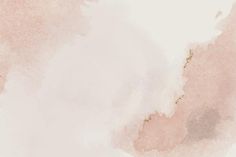 a pink and gold watercolor background