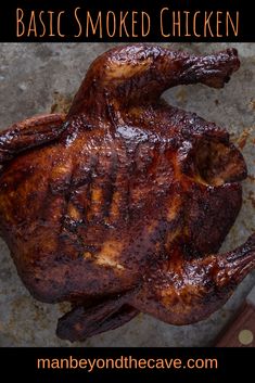 a cooked chicken on a pan with the words basic smoked chicken