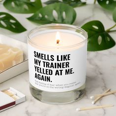 a candle that says smells like my trainer fell at me again