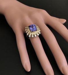 10.20 Carats Natural Very Nice Looking Tanzanite and Diamond 14K Solid Yellow Gold Ring Suggested Replacement Value: Approx. $9,600.00 Total Natural Cushion Cut Tanzanite Weight is: Approx. 8.30 Carats Tanzanite Measures: Approx. 12.00 x 10.00mm Natural Round Diamonds Weight: Approx. 1.90 Carats (color G-H / Clarity SI1-SI2) Ring total weight: Approx. 9.4 grams Disclaimer: all weights, measurements and colors are approximate and may vary slightly from the listed dimensions or as seen in the imag Luxury Yellow Gold Gia Certified Gemstones, Luxury Gia Certified Yellow Gold Gemstones, Elegant Gia Certified Gemstones, Luxury Tanzanite Diamond Ring Gia Certified, Luxury Gia Certified Tanzanite Diamond Ring, Elegant Gold Tanzanite Diamond Ring, Luxury Baguette Cut Gemstones, Luxury Yellow Gold Gia-certified Sapphire Ring, Luxury Gia Certified Yellow Gold Sapphire Ring