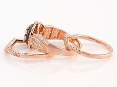 Bella Luce ® mocha diamond simulant .39ctw round and white diamond simulant 1.36ctw round and square, Eterno ™ 18k rose gold over sterling silver and black rhodium over sterling silver ring with bands. Measure approximately 9/16"L x 1/4"W and are not sizeable. The diamond equivalent weight is 1.01ctw. Rose Gold Jewelry With Cubic Zirconia In Round Band, Rose Gold Cubic Zirconia Wedding Ring With Pave Setting, Rose Gold Jewelry With Pave Setting In Round Band, Rose Gold Cubic Zirconia Round Band Jewelry, Gia Certified Rose Gold Cubic Zirconia Rings, Rose Gold Flower-shaped Rings With Cubic Zirconia, Levian Chocolate Diamonds Rings Wedding Bands, Gold Crystal Ring With Rose Cut Diamonds, Open Design, Rose Gold Flower-shaped Cubic Zirconia Rings