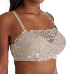 When you want the look of a camisole without the bulk, this wireless cami bra is the answer. Designed for the plus-size as well as the average-size woman, this lace-trimmed beauty looks great peeking out from beneath blouses and tops, and can make any outfit office-appropriate. Multi-part, wireless cups have a beautiful lace overlay on very light foam padding for no nipple show-through. Elastic underband provides excellent support. Wide inner center panel is great for wide-spaced breasts. Elasti Beige Camisole With Built-in Bra And Spaghetti Straps, Lace Underwire Camisole Bra Friendly, Lace Camisole Bra With Adjustable Straps, Beige Bra-friendly Camisole, Elegant Camisole Bra With Medium Bust Support, Lace Tops With Underwire And Bra Friendly Design, Beige Spaghetti Strap Bra-friendly Camisole, Elegant Tops With Adjustable Straps And Underwire, Camisole With Removable Bra Pads