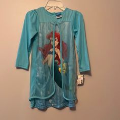 Little Mermaid Nightgown Condition: Brand New With Tags Size: 5 Brand: Disney Long Sleeve Sleepwear With Character Print, Blue Long Sleeve Sleepwear With Character Print, Blue Character Print Sleepwear For Pajama Party, Character Print Long Sleeve Sleepwear For Sleepover, Blue Character Print Sleepwear, Blue Long Sleeve Bedtime Dress, Blue Long Sleeve Dress For Pajama Party, Playful Long Sleeve Dresses For Sleepover, Long Sleeve Disney Sleepwear For Bedtime