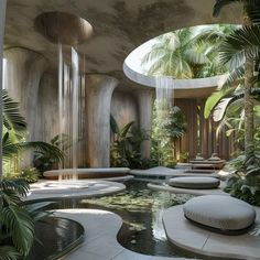 an indoor swimming pool surrounded by greenery and water features in the middle of it