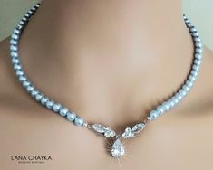 Wedding Light Blue Blush Blue Pearl Silver Choker Bridal Necklace. NECKLACE is about 18 inches (45.7cm) long. BACKDROP is about 4 inches (10.1cm). JEWELRY SETS SECTION: https://www.etsy.com/shop/LanaChayka?ref=seller-platform-mcnav§ion_id=18873488 BRIDAL JEWELRY SETS SECTION: https://www.etsy.com/shop/LanaChayka?ref=seller-platform-mcnav§ion_id=25839214 BRIDAL NECKLACES SECTION: https://www.etsy.com/shop/LanaChayka?ref=seller-platform-mcnav§ion_id=11638944 Elegant and classy, this stunning neckl Blue Pearl Necklace, Pearl Wedding Necklace, Statement Necklace Wedding, Bridal Necklaces, Akoya Pearl Necklace, Pearl Necklace Wedding, Wedding Pendant, Pendants Necklaces, Cz Necklace