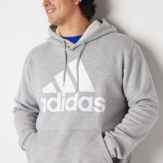 This hoodie from the adidas men's big and tall collection is an off-duty and workout style essential. Made from soft cotton-fleece, this long-sleeve hooded sweatshirt features a front kangaroo pocket and the brand's signature stripes and logo. Style it with jogger pants or workout shorts. Features: Drawstring, Hooded, Banded BottomClosure Type: Pullover HeadFit: Regular FitNeckline: Hooded NeckPockets: 1 Front Kangaroo PocketSleeve Length: Long SleeveApparel Length: 29 InchesFiber Content: 78% C Adidas Fleece Hoodie Sportswear, Adidas Cotton Activewear, Athletic Fit, Adidas Cotton Hoodie For Sports, Adidas Winter Activewear For Workout, Adidas Winter Workout Activewear, Winter Workout Adidas Activewear, Winter Adidas Activewear With Logo, Adidas Athleisure Sweatshirt For Gym, Adidas Winter Gym Activewear