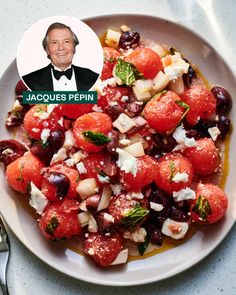 a white plate topped with lots of food and a man's face next to it