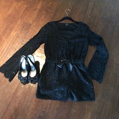 This Black Lace Romper Is A Great Choice For A Night Out!! Wear It For A Vegas Weekend Or With A Pair Of Flats During Those Cooler Days!! It's Is Beautiful Lace!!!! The Detailing On The Edge Of The Sleeves Shows It!!! Worn Once Like Brand New! Size Xs! Lace Long Sleeve Jumpsuits And Rompers For Party, Elegant Lace Jumpsuits And Rompers For Night Out, Black Jumpsuit For Formal Spring Events, Elegant Lace Jumpsuits And Rompers For Spring, Elegant Long Sleeve Lace Jumpsuits And Rompers, Black Lace Jumpsuit For Night Out, Elegant Black Lace Jumpsuits And Rompers, Elegant Lace V-neck Jumpsuits And Rompers, Elegant Lace Jumpsuit With V-neck