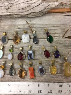 "We currently have a number of pendant jewelry samples available from our shop. The typical design is shown in the photos and video. Made from a combination of sterling silver, brass and copper. Fits most chain widths. Typical length is 1\" - 1 1/2\" inches for a Boho, Statement Design look. Handcrafted. Enjoy a silver gemstone pendant for a fraction of the price. The pictures display the possible options but we have many designs, gemstone shapes and types. Package of 1. We have over 20 years ex Artisan Gold Teardrop Pendant Jewelry, Sterling Silver Pendant Jewelry, Collectible Oval Pendant Charms Jewelry, Artisan Teardrop Pendant Jewelry Nickel Free, Bohemian Jewelry In Assorted Shapes As A Gift, Nickel-free Assorted Jewelry Gift, Bohemian Jewelry In Various Shapes For Gifts, Nickel-free Rectangular Pendant Jewelry For Anniversary, Bohemian Jewelry In Various Shapes As Gifts