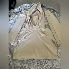 Brand New! Beige Hoodie With Double-lined Hood And Long Sleeves, Beige Hoodie With Drawstring Hood, Beige Hooded Top For Loungewear, Beige Long Sleeve Sweatshirt With Adjustable Hood, Cream Hooded Tops For Loungewear, Cream Hooded Loungewear Top, Hooded Cream Tops For Loungewear, Cozy Beige Hoodie Top, Sporty Beige Top With Drawstring Hood