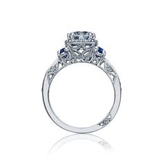 a diamond and blue sapphire engagement ring with an intricate design on the shan shan shan shan shan shan shan shan shan shan shan shan shan shan shan shan shan shan shan shan shan shan shan shan shan shan shan shan