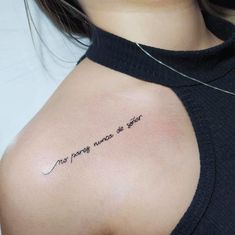 a woman with a tattoo on her shoulder that says, no matter where you are going