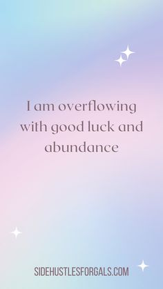 the quote i am overflowing with good luck and abundance on a pastel background