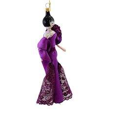 Elevate Your Holiday Decor With Our 7 Inch Tall Christmas Ornament From De Carlini's Fashionista & Shopper Collection. Meet Alexandra. Made Of Free Blown Italian Glass, This Ornament Features A Holiday Fashionista In An Elegant Satin Purple One Shoulder Dress, Trimmed With Delicate Floral Lace And Ultra Fine Glitter. Add A Touch Of Simple Grace And Elegance To Your Tree Or Give As A Perfect Gift For Any Fashion Lover.. Indoor. Imported Elegant Purple Dress, Purple One Shoulder Dress, Elegant Purple Dresses, Dino Decorations, Dress Shopping, Christmas Trends, Diva Fashion, Purple Dress, Fashion Lover