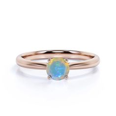 "Genuine mines Rainbow Moonstone 14k Solid Yellow Gold Engagement Ring Minimalist Gemstone Jewelry Gift for her / Mothers Day / Wife / Daughter.  Ring Size:  All Size Available Metal : 14K Solid Yellow Gold (Stamped) / Option available in 18K Gemstone: Rainbow Moonstone Moonstone Weight : 0.45 CT Gemstone shaped : Round  * Rings also available in other gemstone for enquire please contact with us ★ All our products come packaged in beautiful boxes that can be used for gifting purposes. ------------------------- ★ Customization: - The design can be made with gemstones of your choosing. If you would prefer a custom Ring, please contact us before purchase. ------------------------- ★ Procedure information Please select the material and Ring size from the drop-down menu on the right side of the Dainty Opal Promise Ring With Birthstone, 14k Gold Minimalist Moonstone Promise Ring, Adjustable 14k Gold Opal Birthstone Ring, 14k Gold Opal Birthstone Ring For Promise, Minimalist Promise Opal Ring, Minimalist 14k Gold Opal Ring With Round Band, Dainty Round Opal Promise Ring, Minimalist 14k Gold Solitaire Opal Ring, Rose Gold Opal Birthstone Ring For Gift