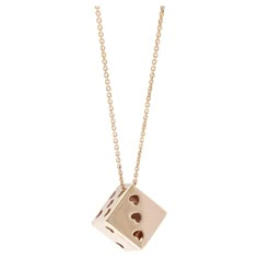 This unique 18K rose gold pendant necklace, designed and made in Italy, is in the form of a dice cube. It is very trandy and stylish, can be matched with jeans and everyday wear. The company was founded one and a half centuries ago in Macau. The brand is renowned for its high jewellery collections with fabulous designs. Our designs reflect the cultural and aesthetic value of its origin – Macau, where East meets West, with the inspiration from the beauty of oriental and Roman art. The finest hand Dice Necklace, Cube Pendant, Rose Gold Pendant Necklace, Shopping Jewelry, Roman Art, Rose Gold Pendant, Lucky Charms, Jewelry Lookbook, Jewelry Brand